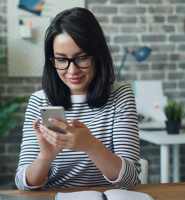 woman looking at carecover website